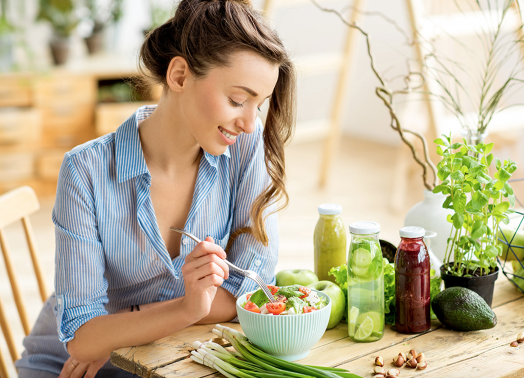 woman maintaining mental and physical health by eating healthy