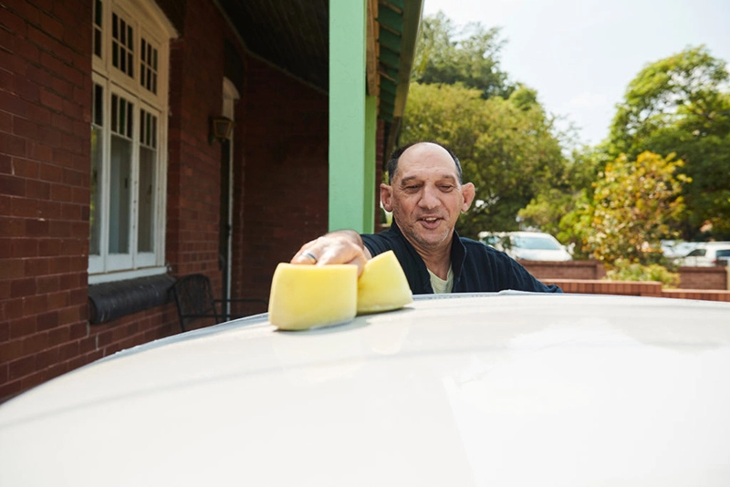 adult washing up with the support of mental health services