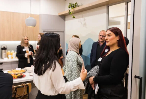 Our team chatting at an event