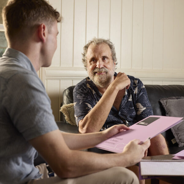 Brett chatting with his support worker