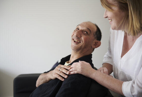 Man and woman laughing