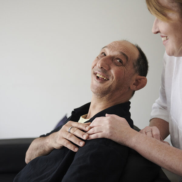 Man and woman laughing