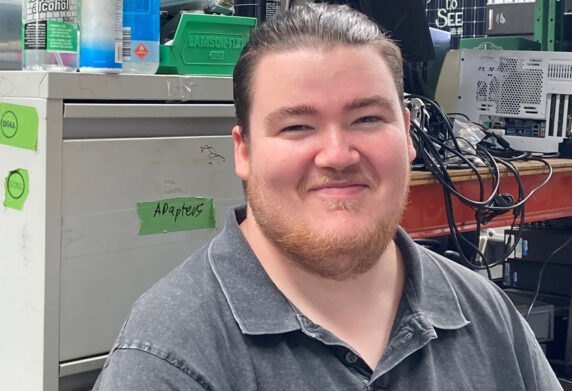 Headshot of Bailey smiling