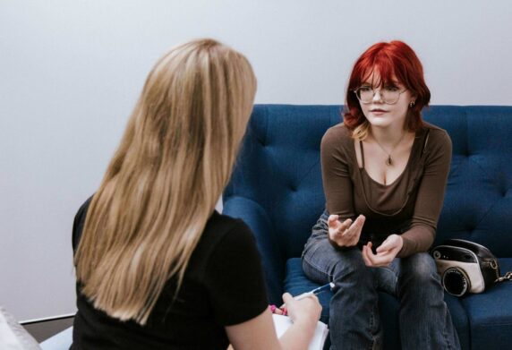 A therapist and client talking