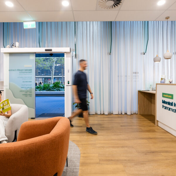 Person walking in entry door to reception area