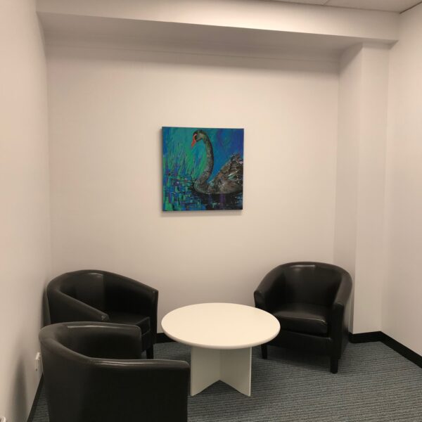 Private room with three chairs and a table